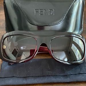 Women’s Fendi sunglasses with case and cloth.